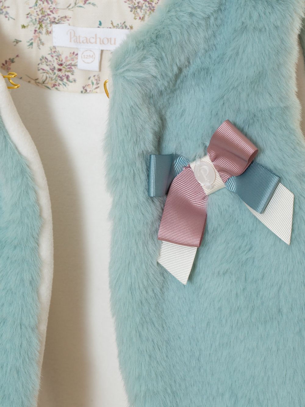 Green fur vest with printed lining