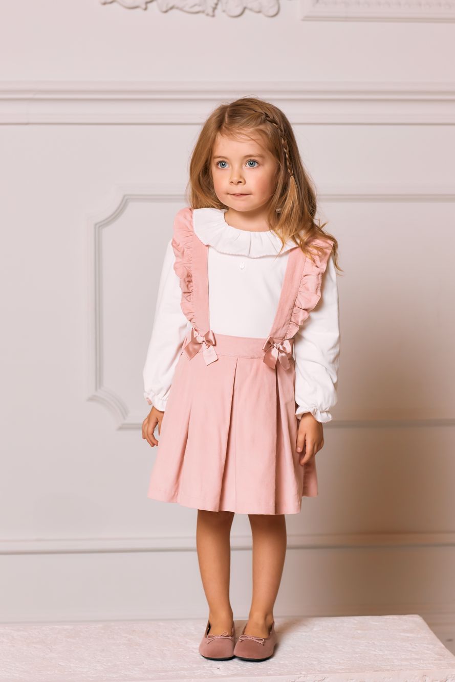 White blouse and pink skirt set