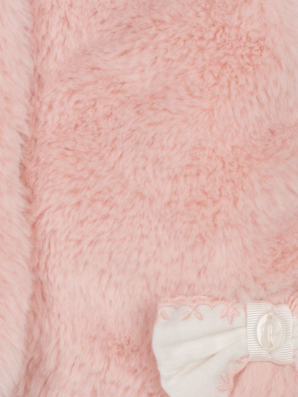 Fur vest with bow