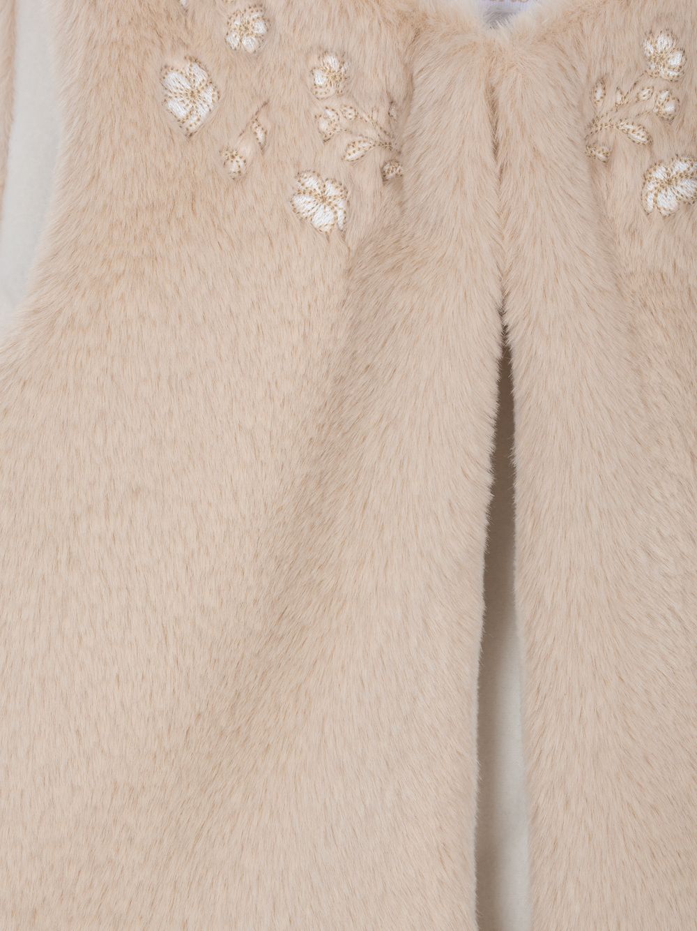 Beige synthetic fur vest