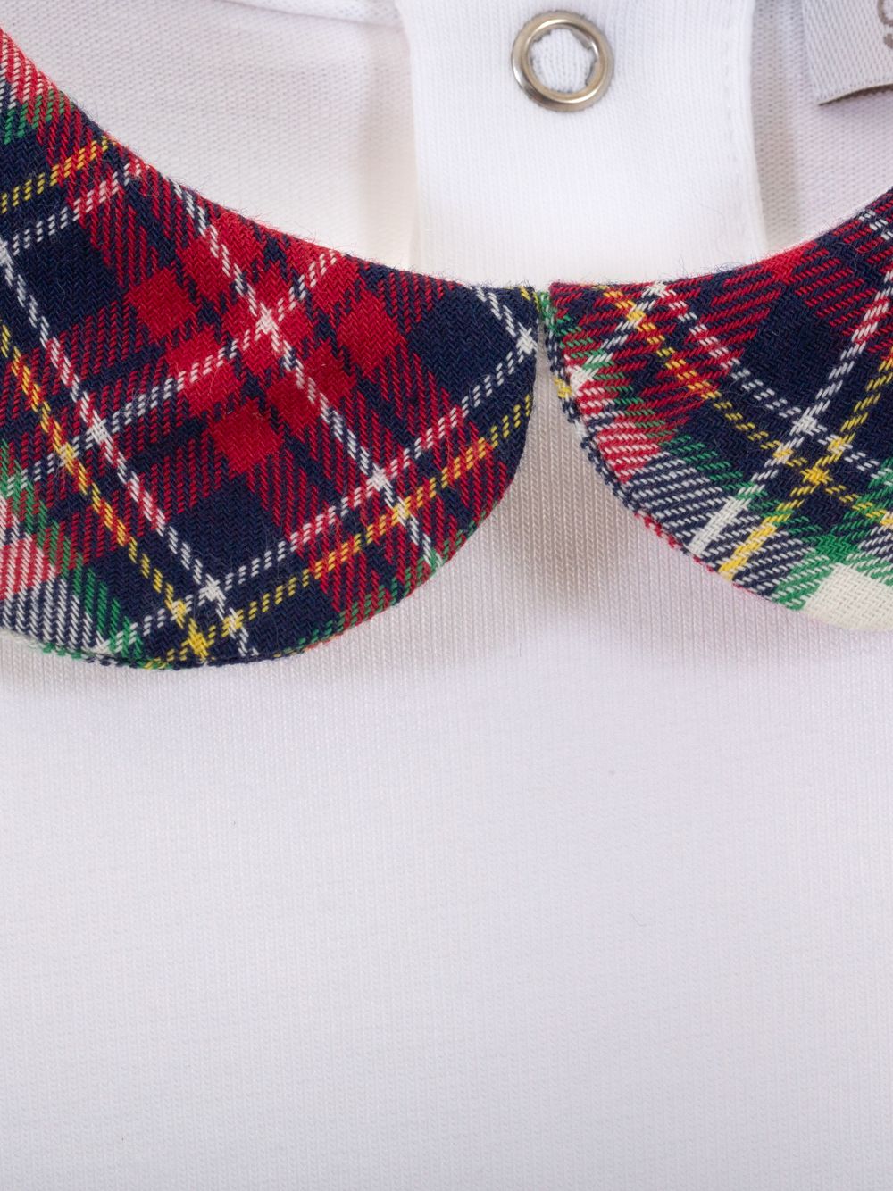 Body in jersey and tartan vayella