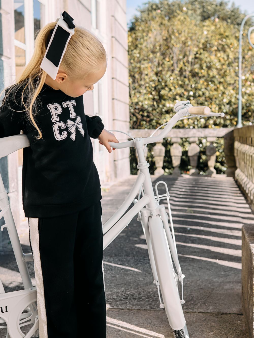 Black pants with bouclé stripes