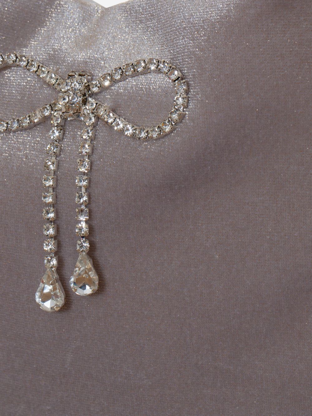 Golden velvet handbag with crystal bow