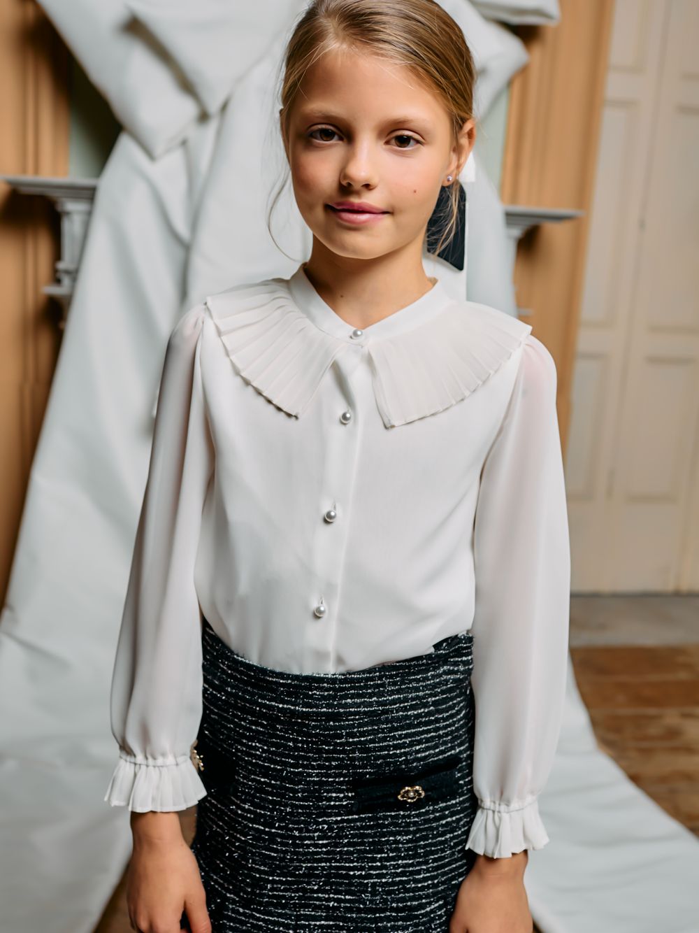 Beige blouse with pleated collar and pearl buttons for girls