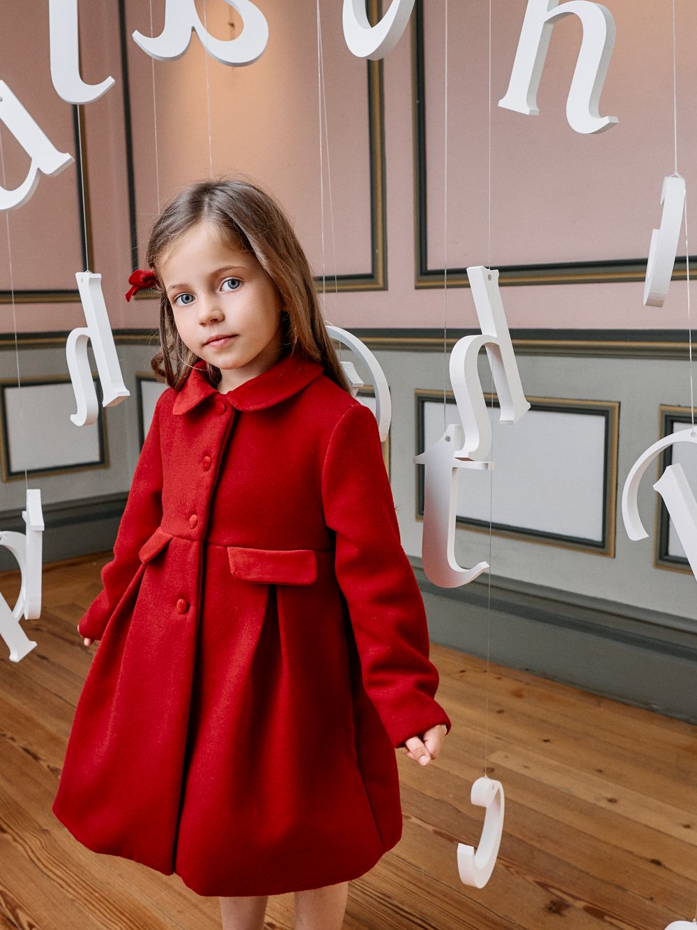 Elegant red coat for girls