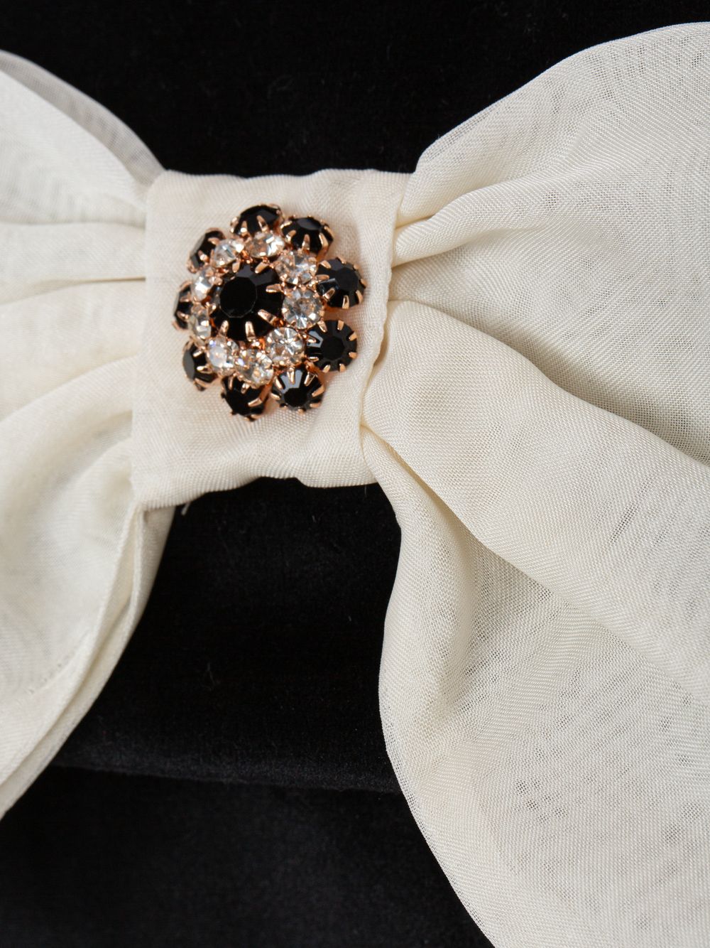 Beige velvet bag with an elegant bow