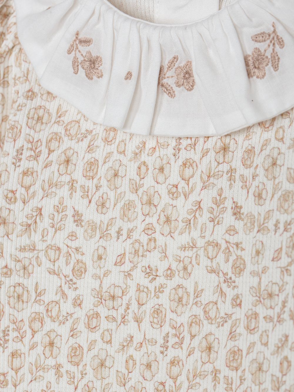 Beige printed bodysuit with a pleated collar