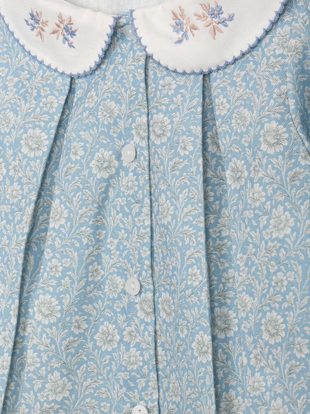 Blue blouse with a floral print