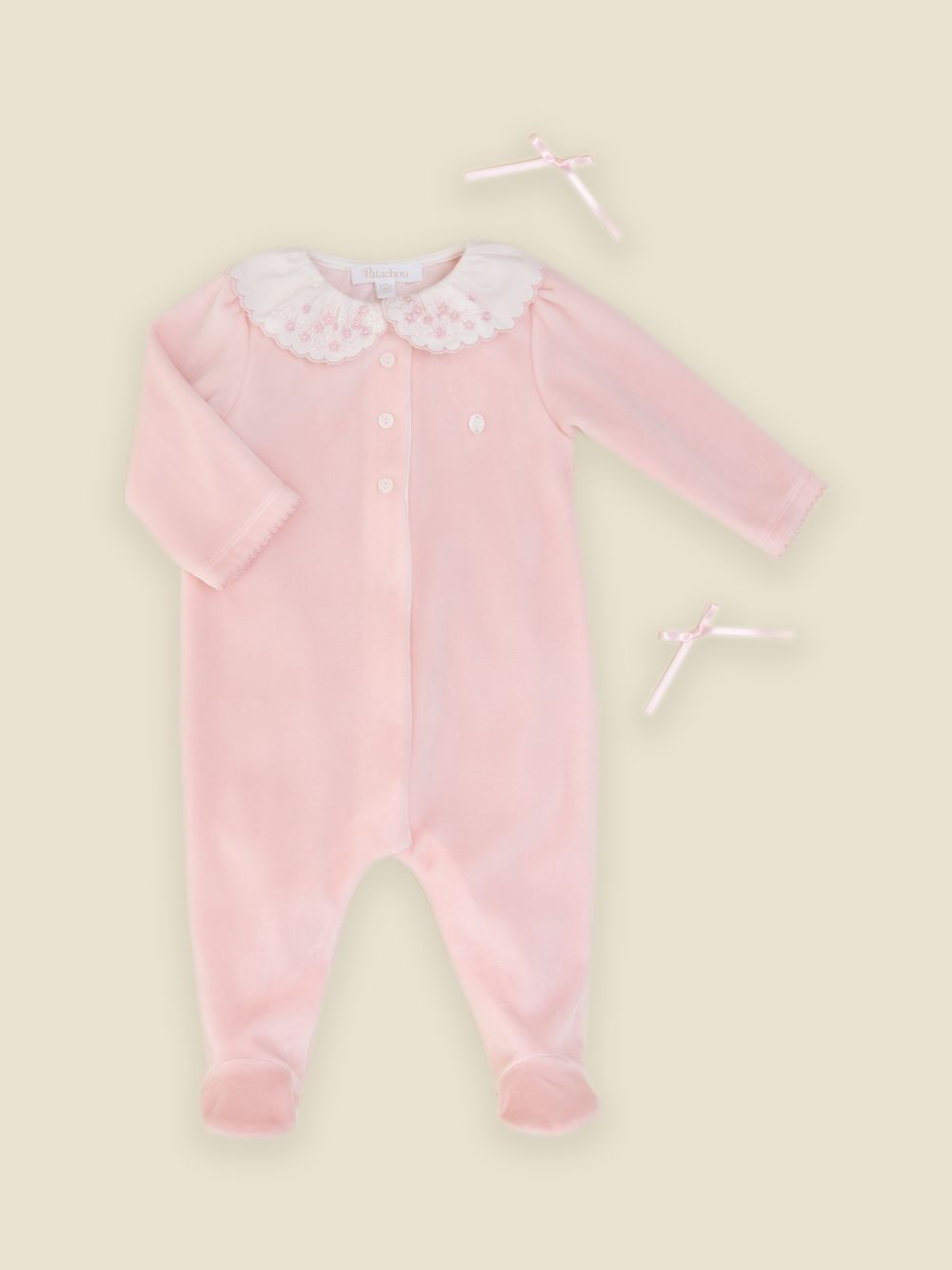 Elegant pink babygrow with embroidered collar