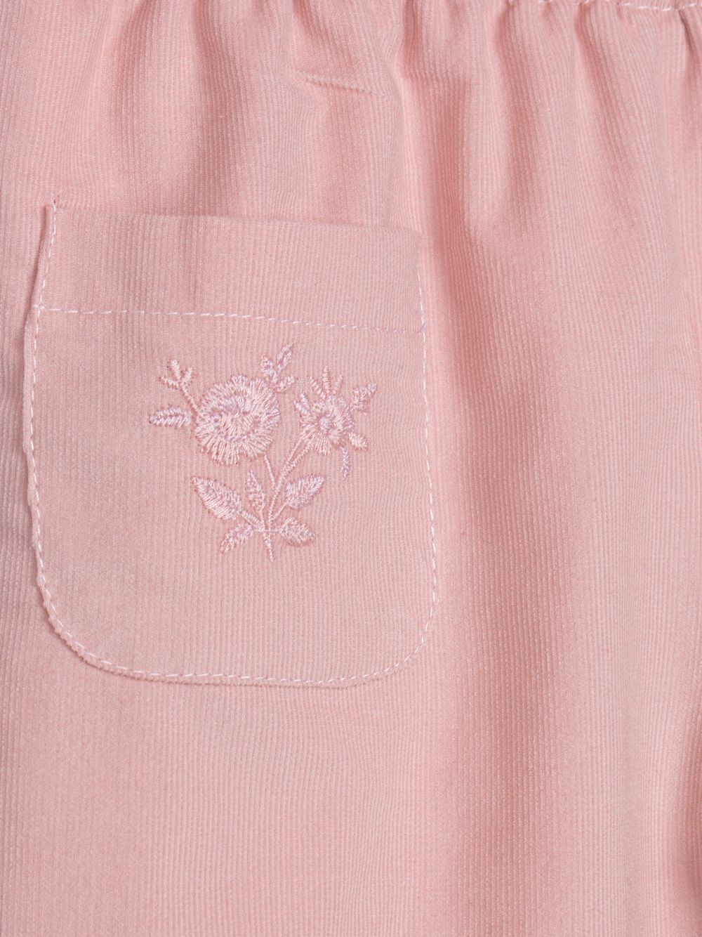 Elegant pale pink embroidered trousers