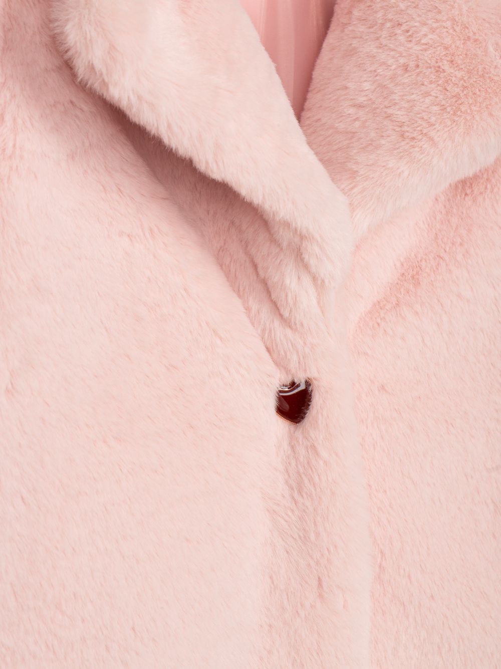 Elegant fur coat in pale pink for girls