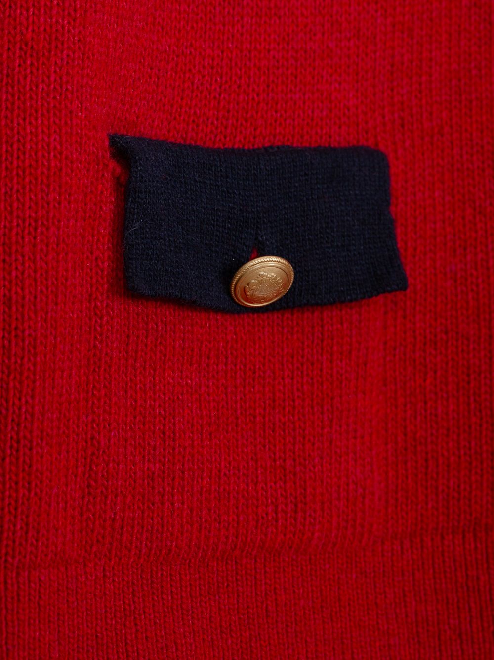 Red sweater with marine blue details
