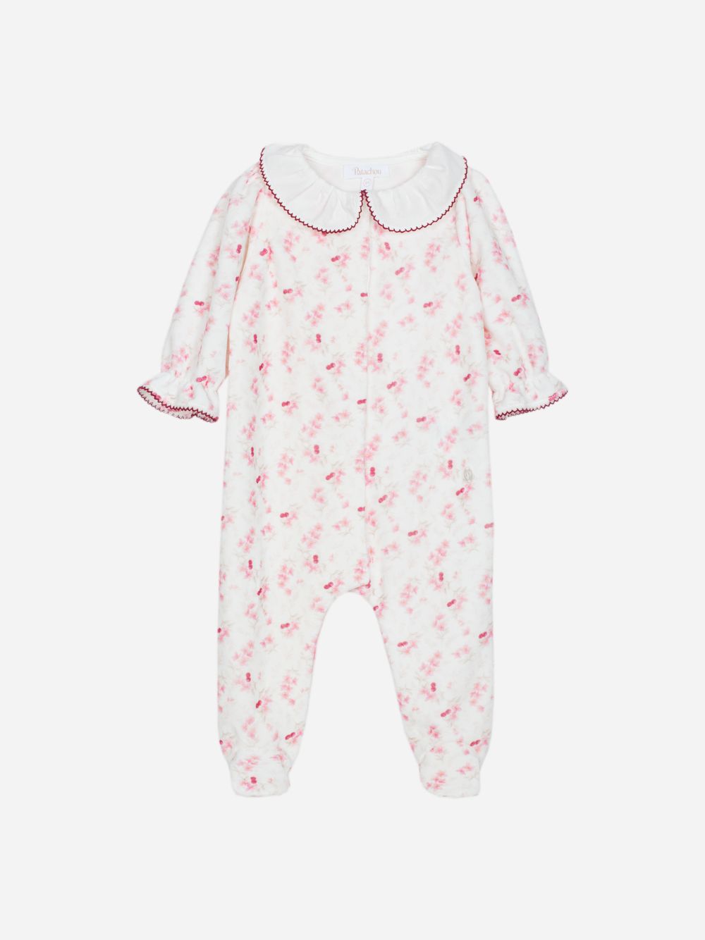 Pink babygrow with floral print