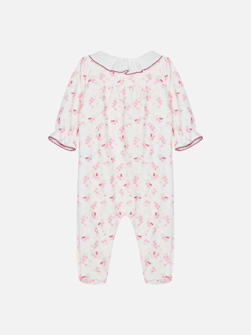 Pink babygrow with floral print