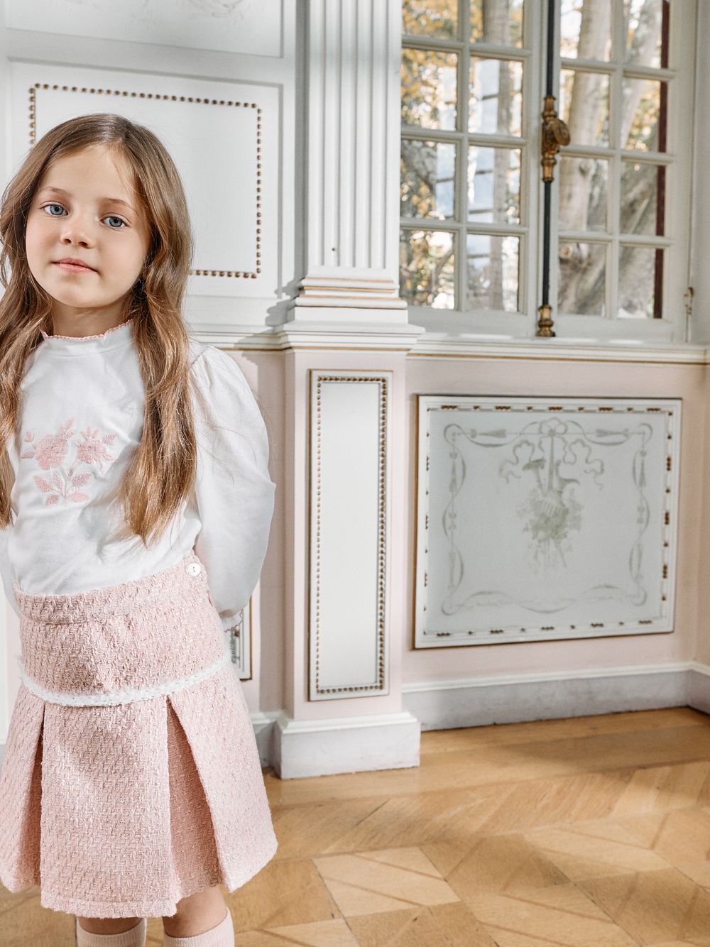 Pale pink blouse with delicate embroidery on the front
