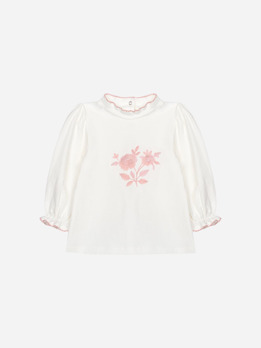 Pale pink blouse with delicate embroidery on the front