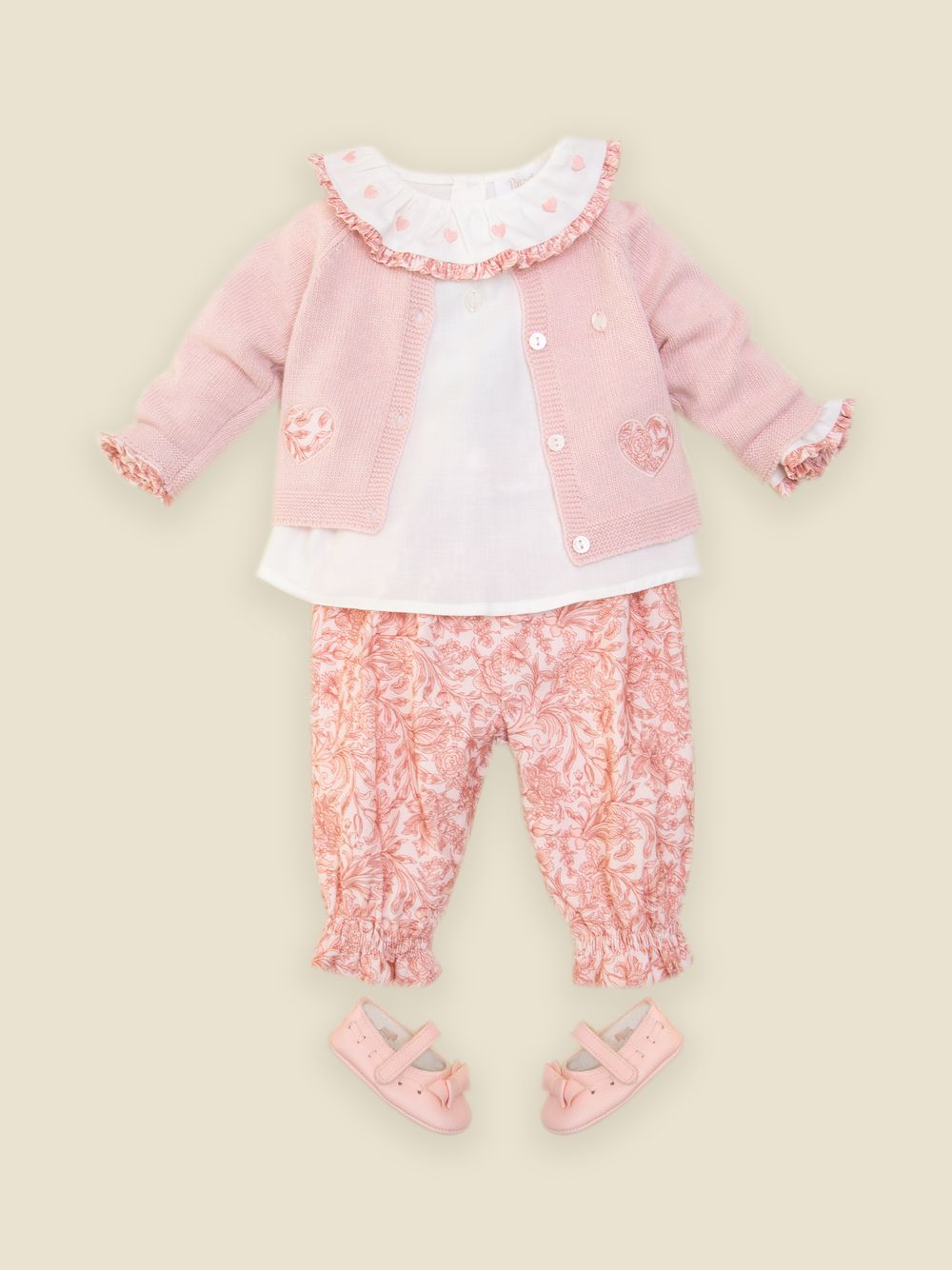Ecru blouse with embroidered details and Liberty print
