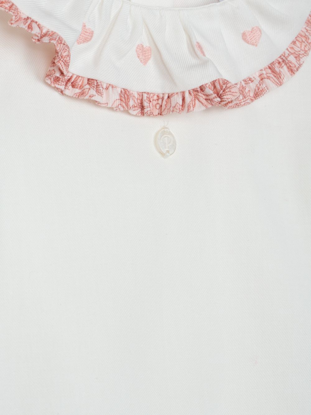 Ecru blouse with embroidered details and Liberty print