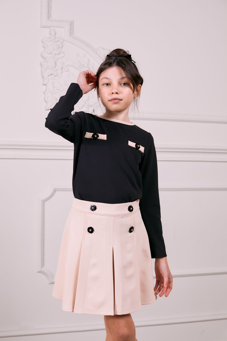Camel top with black trims