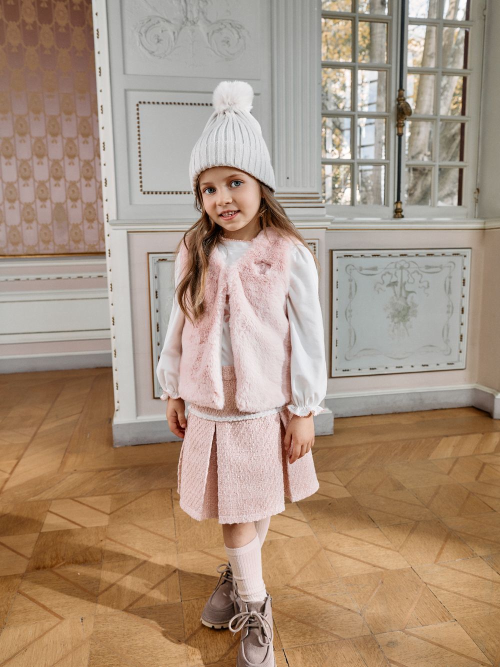 Elegant pale pink vest for girls