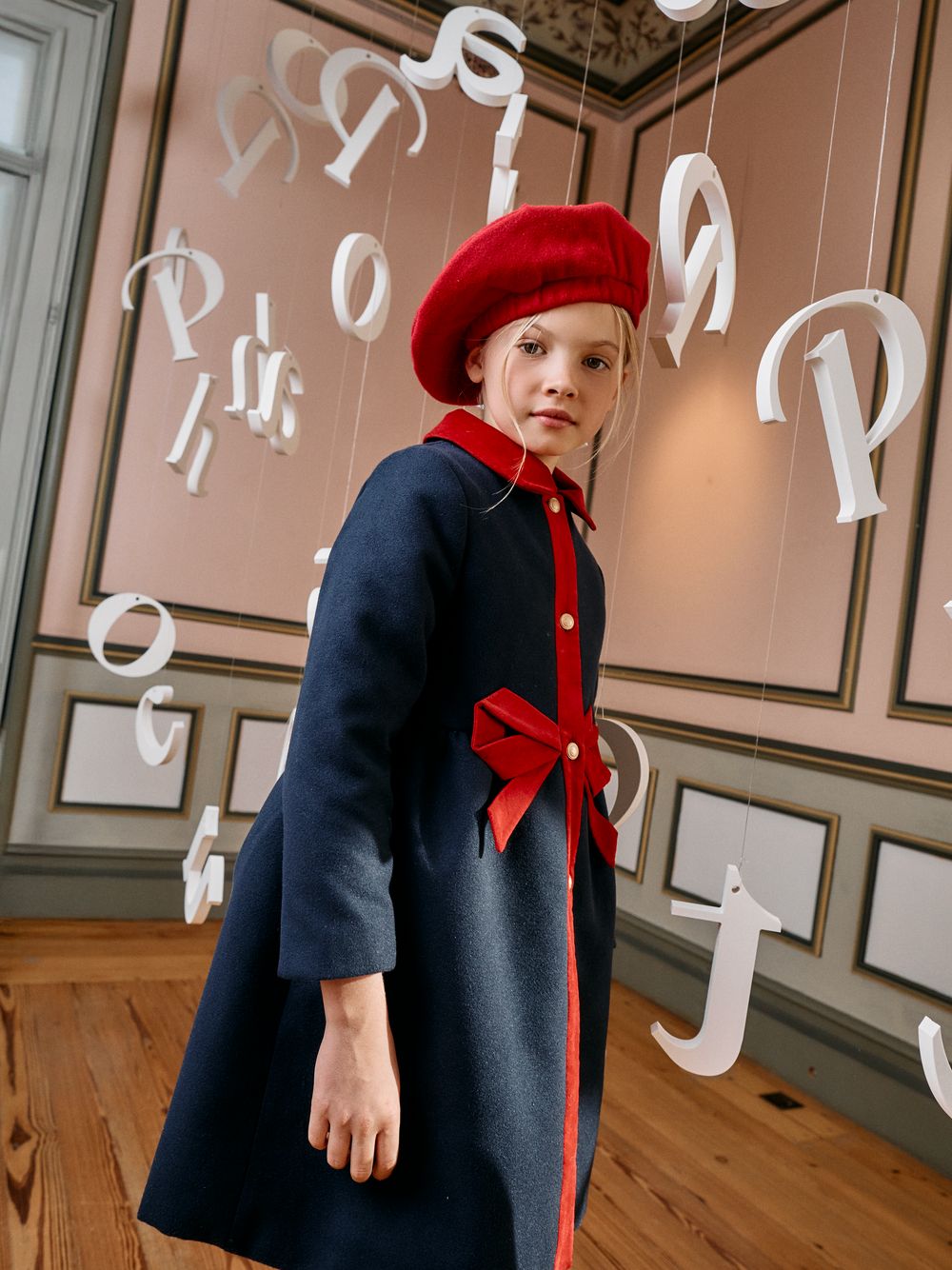Elegant navy blue coat with red details