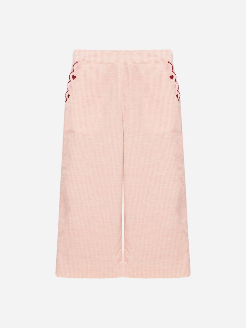 Pale pink pants with embroidery and an elegant finish