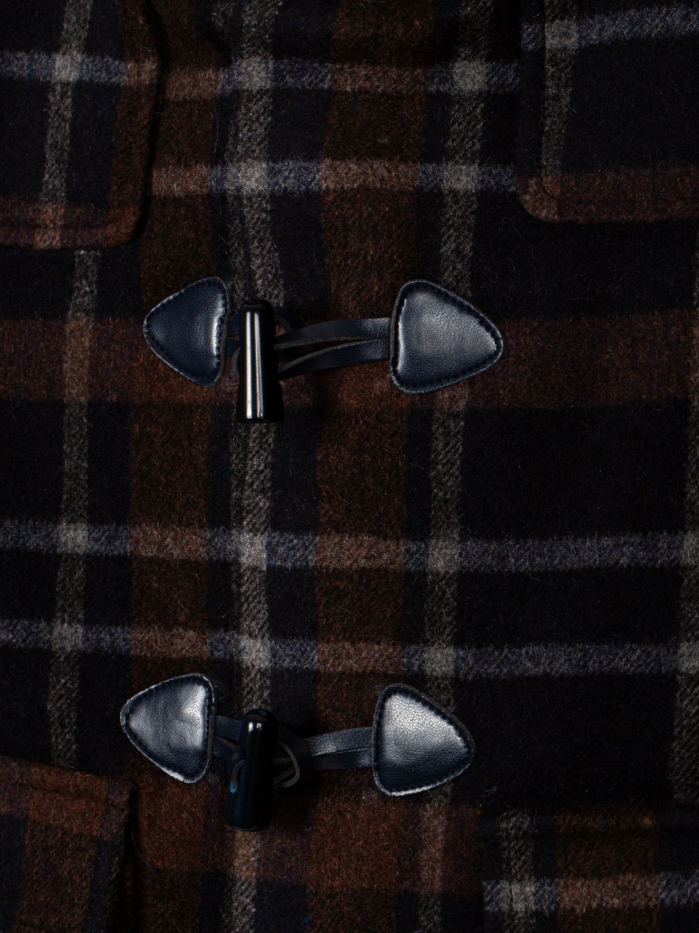 Brown coat with wooden buttons