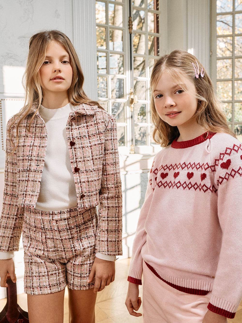 Pale pink sweater with elegant heart pattern