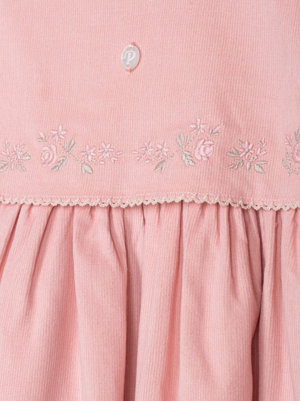 Elegant pale pink dress with floral embroidery