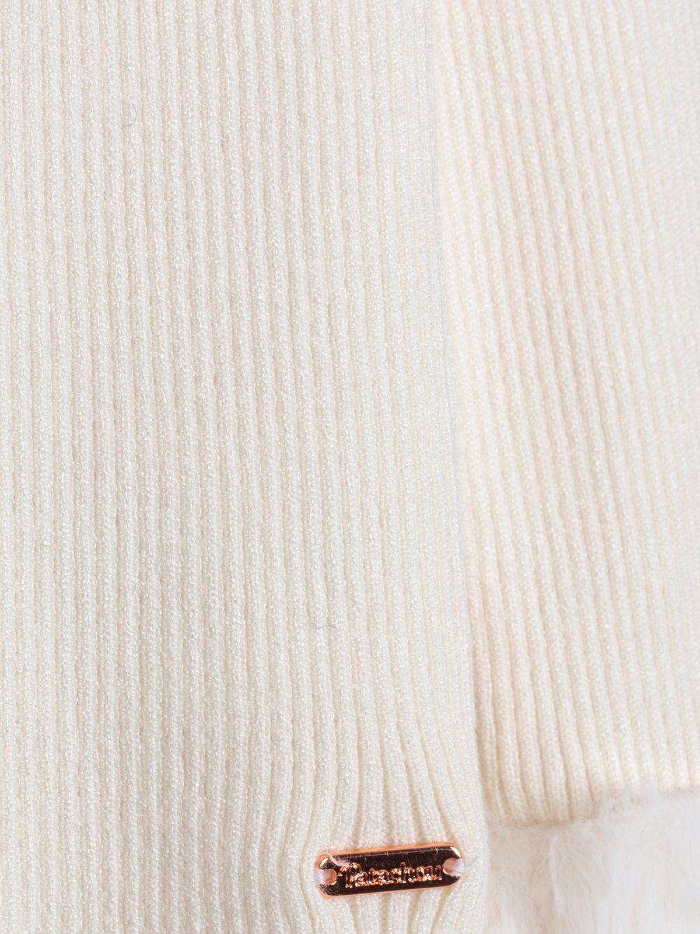 Ecru knit sweater with fur cuffs