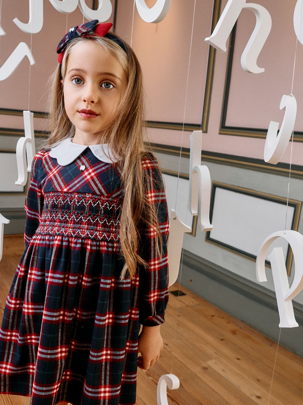 Red dress with a tartan print and white collar