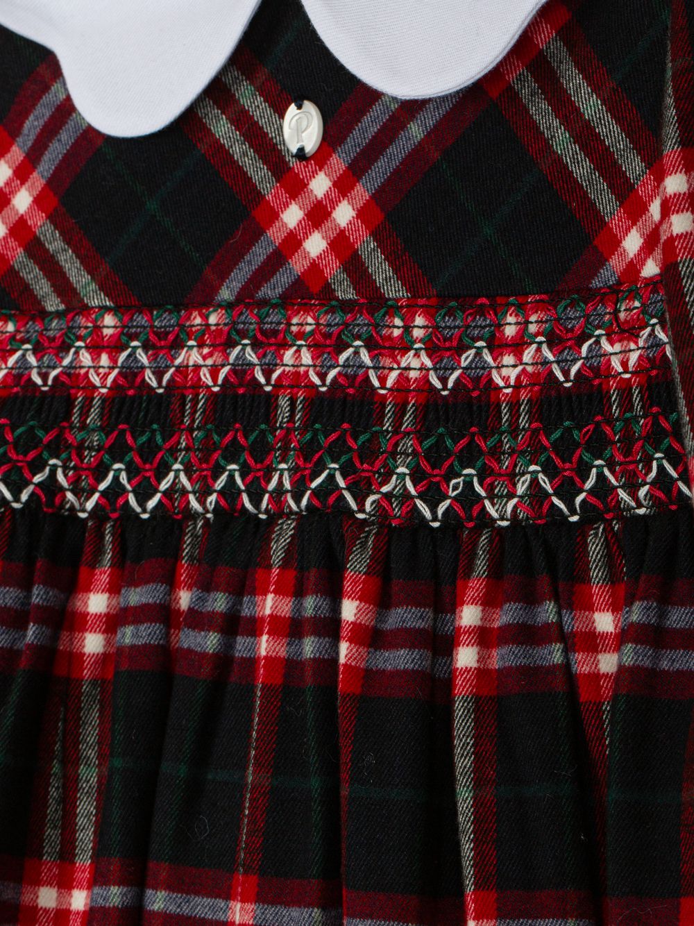 Red dress with a tartan print and white collar