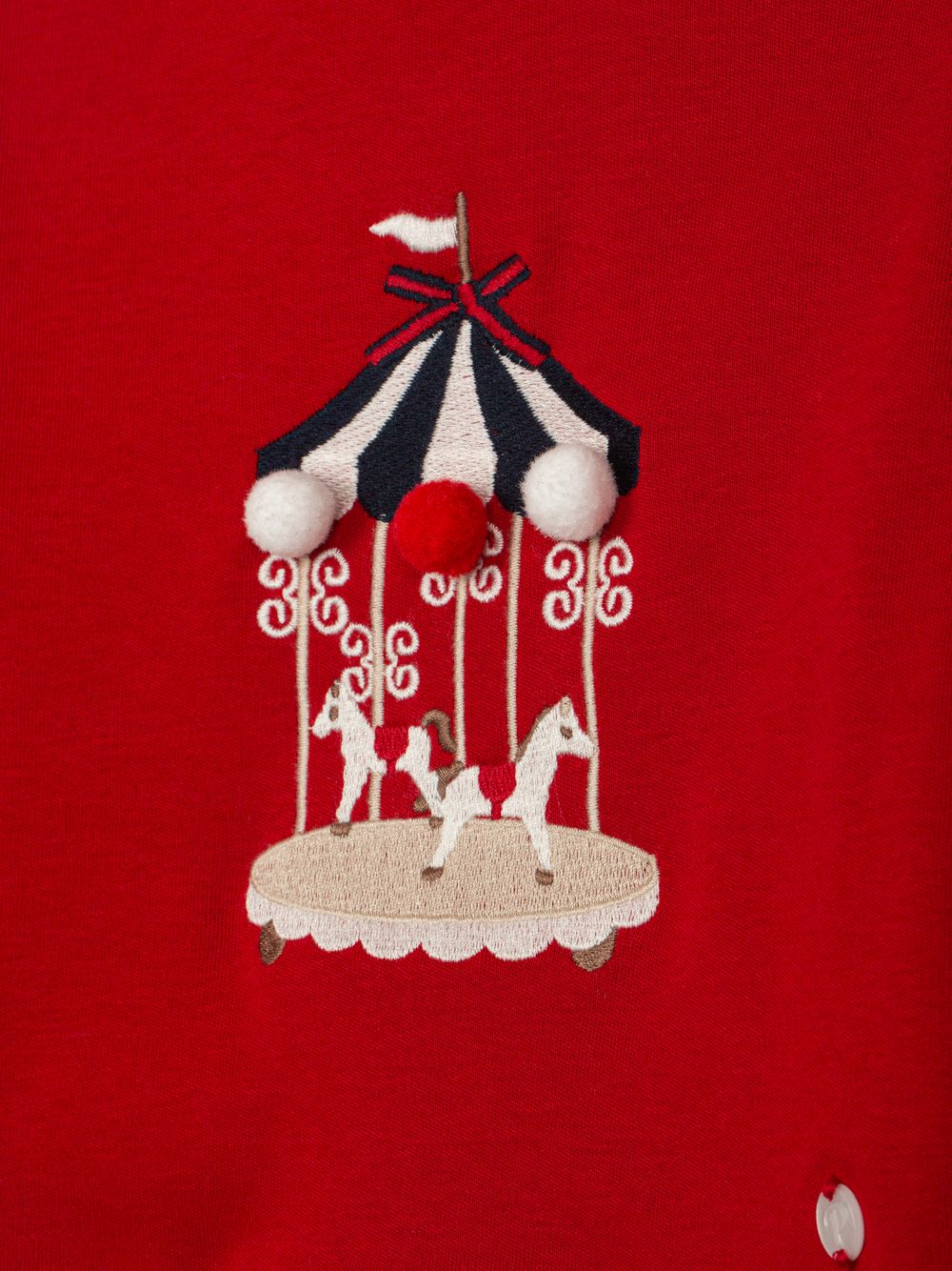 Red set with carousel embroidery on the front