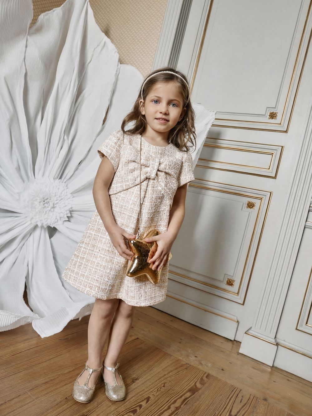 Elegant golden dress with bow