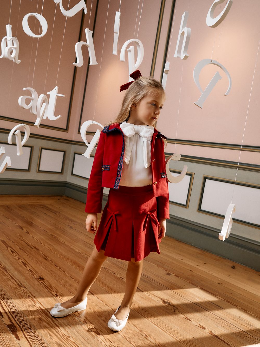 Elegant red skirt with delicate bows