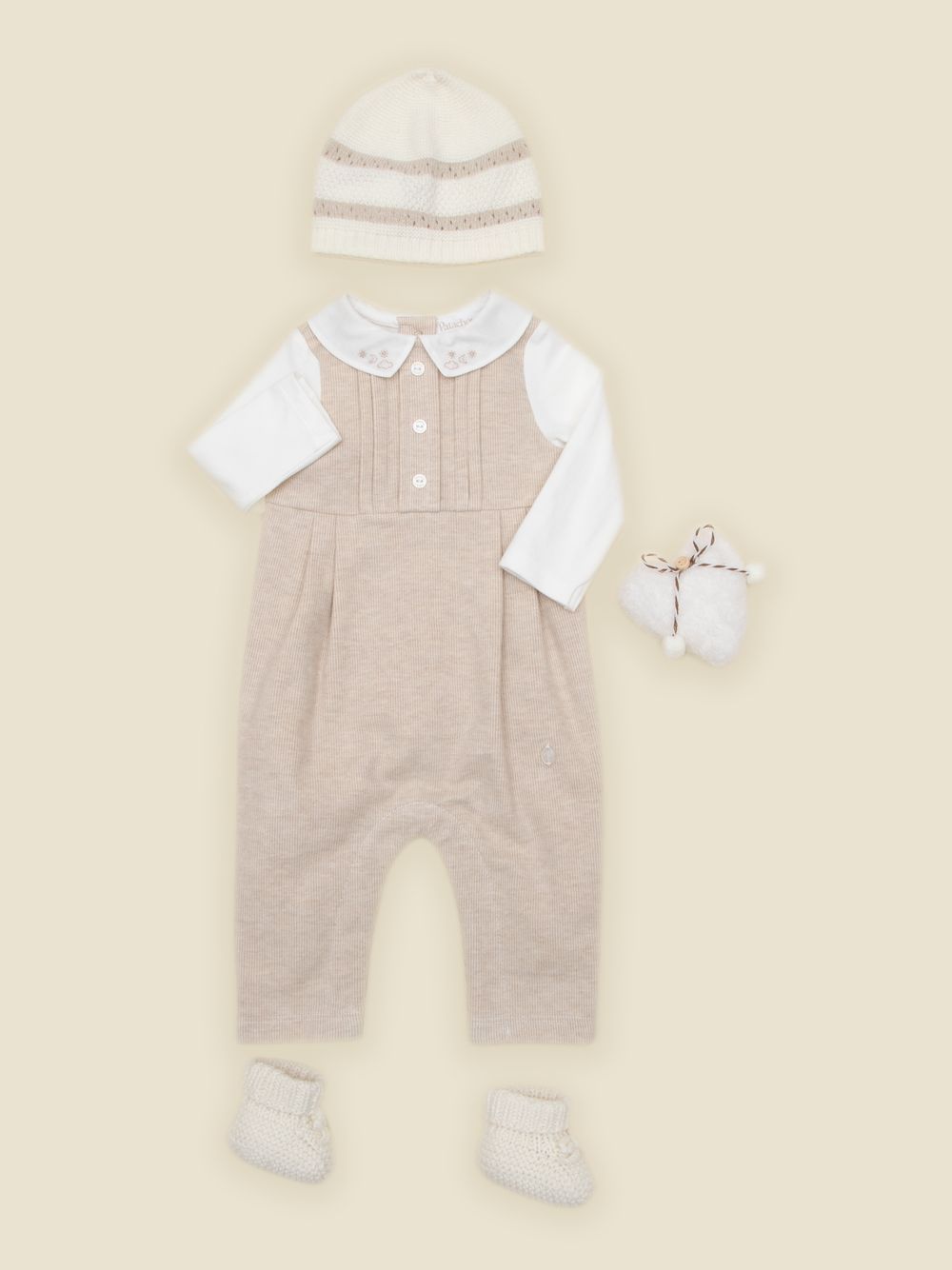 Elegant beige babygrow with embroidered collar