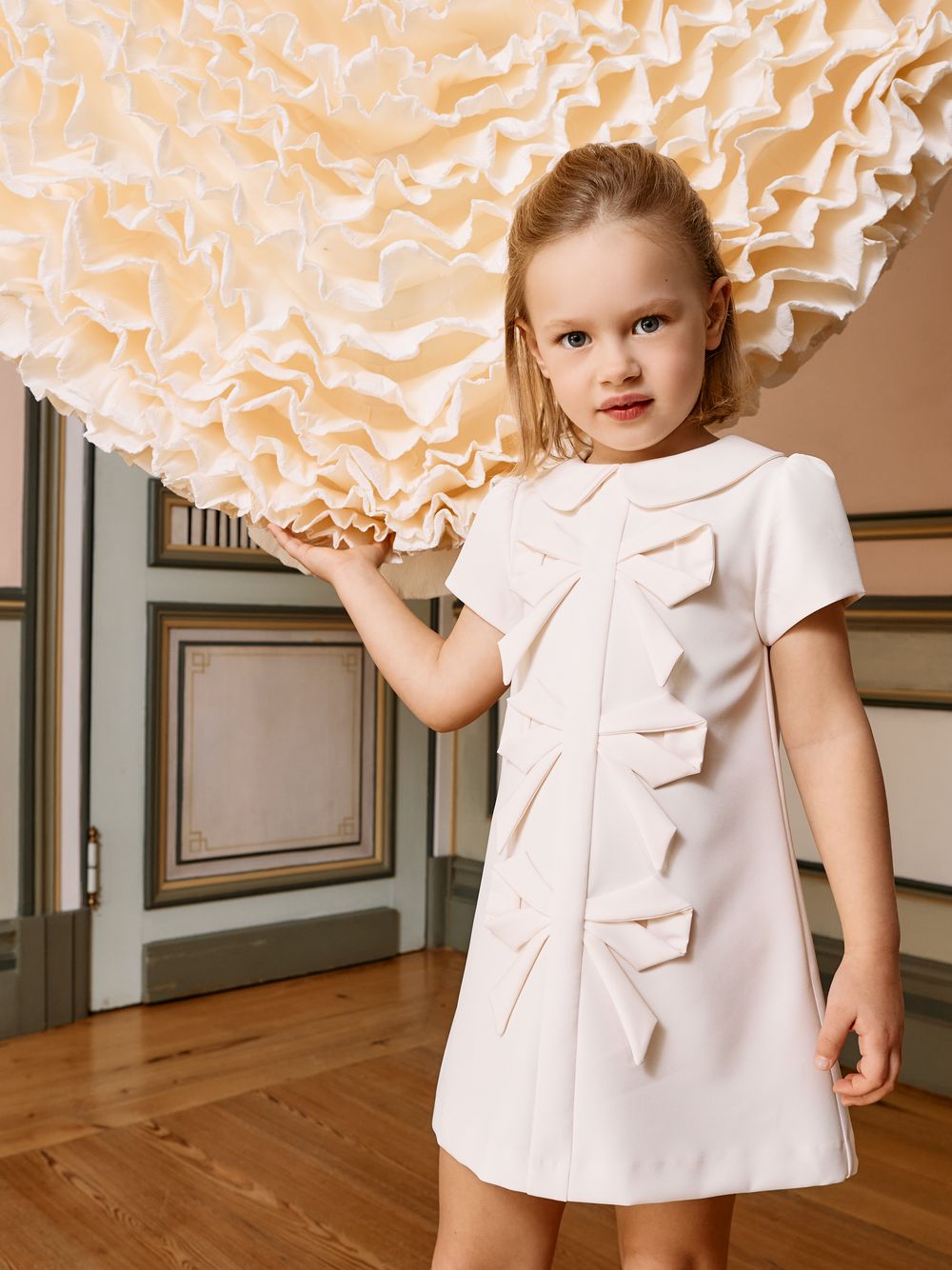Beige crepe dress with bows