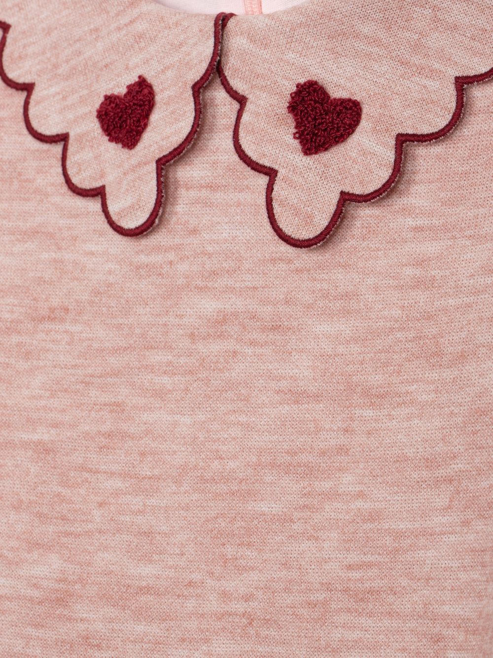 Elegant pink dress with embroidered collar