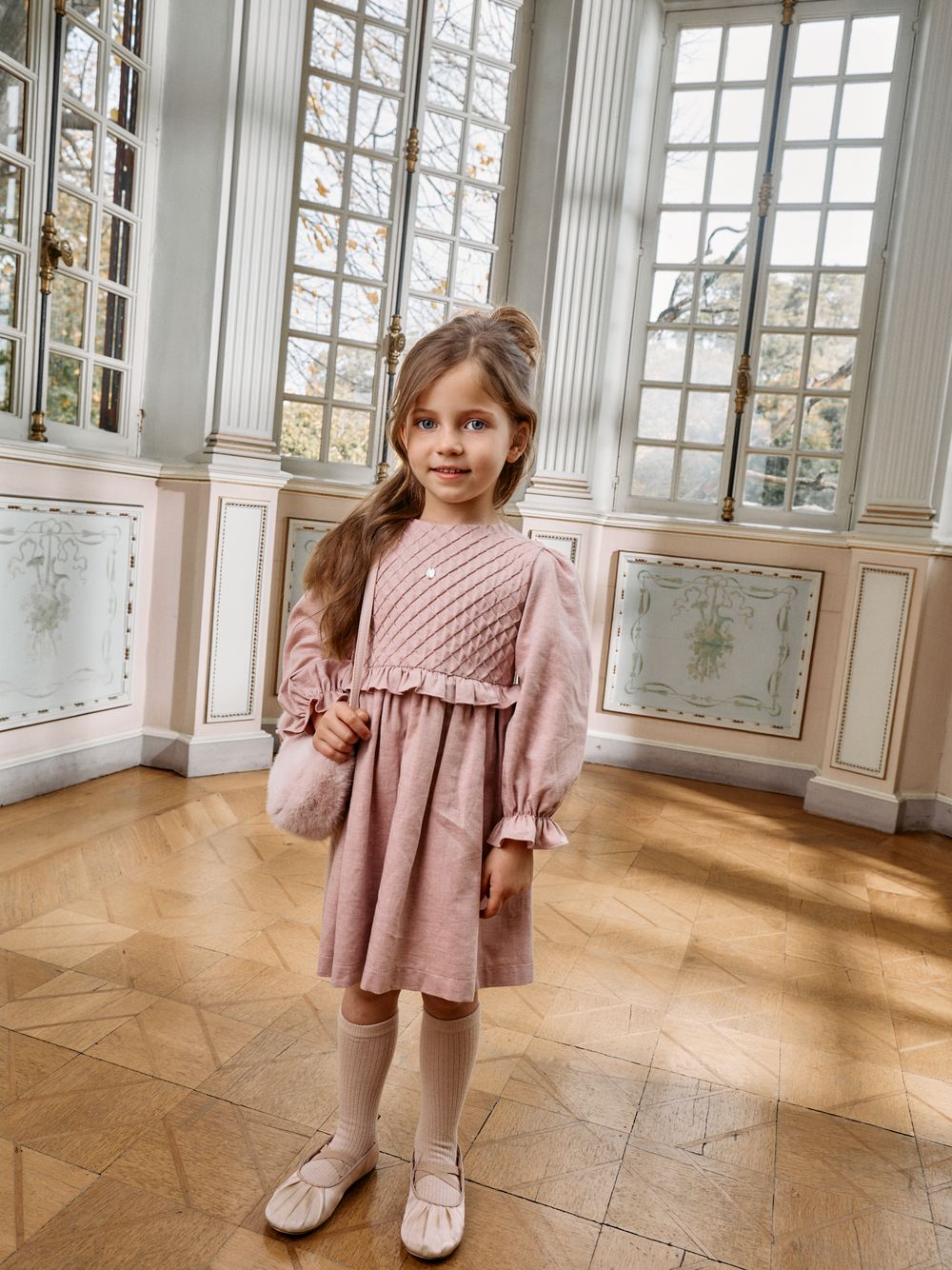 Pale pink dress with elegant details