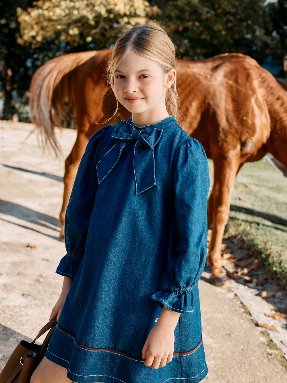 Elegant indigo blue dress with front bow