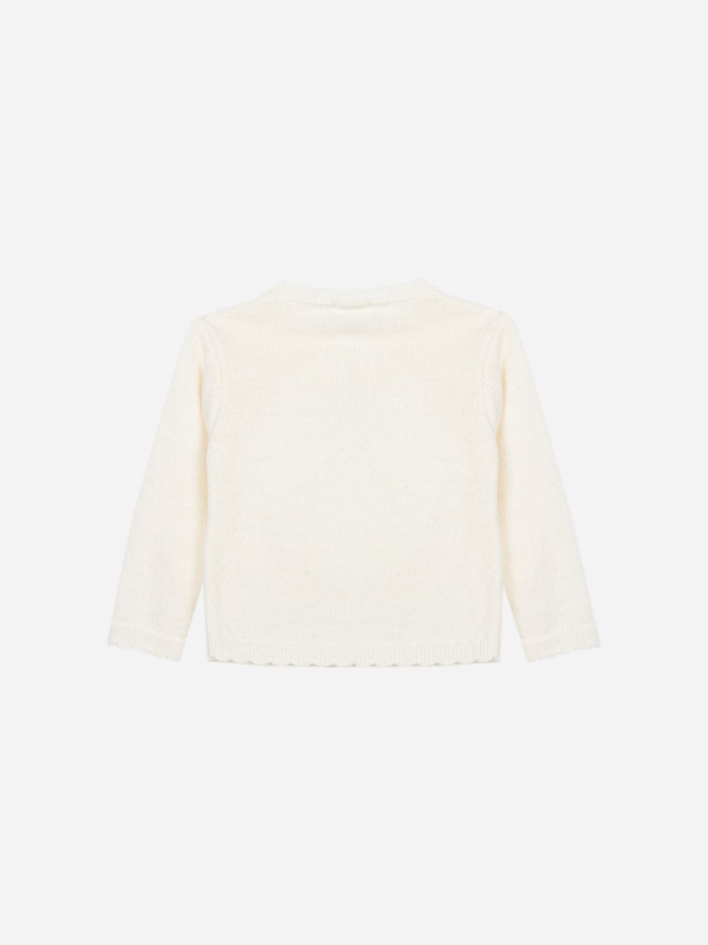 Ecru knit sweater with a design on the front