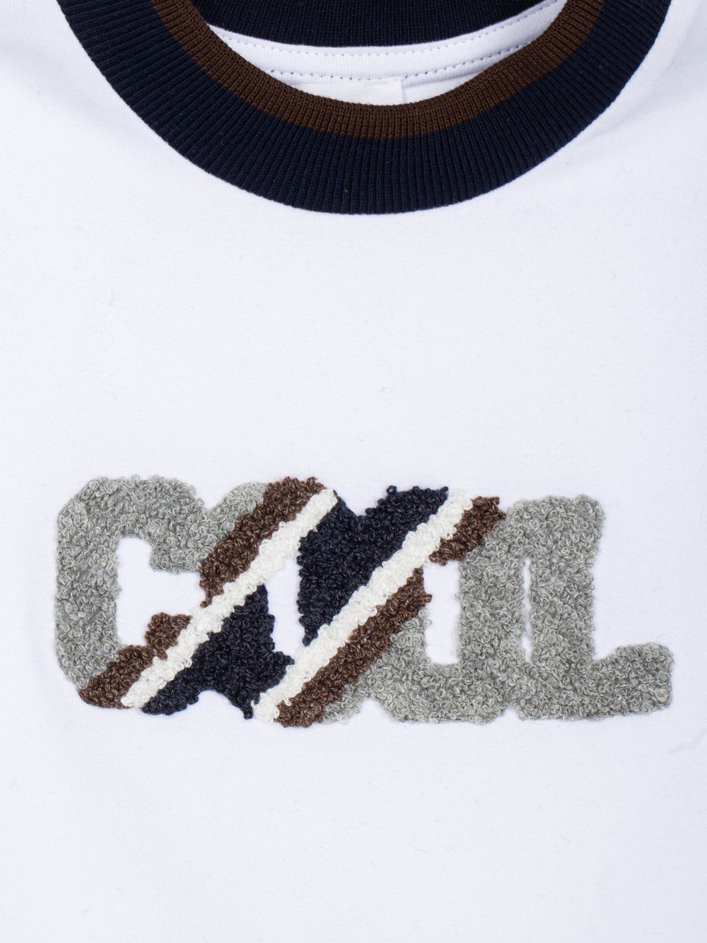 White sweater with front design