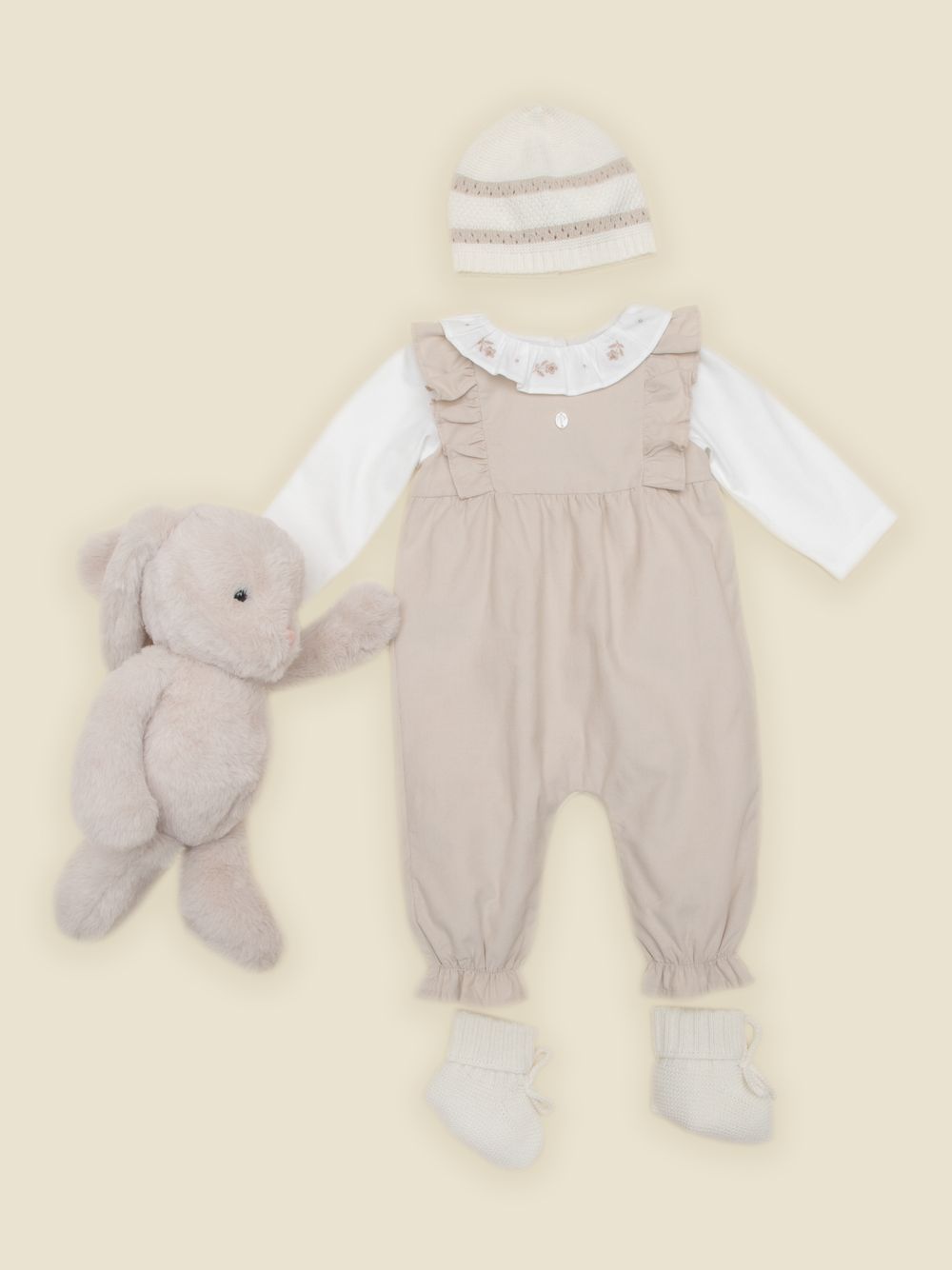 Beige babygrow with ruffles and embroidered collar