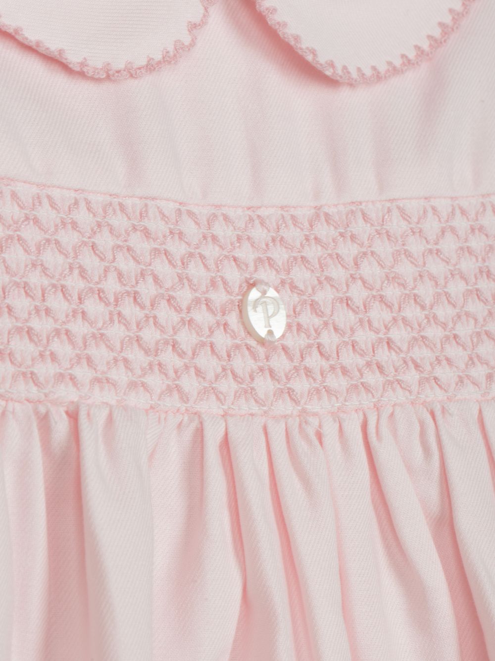Pink dress with smocked embroidery