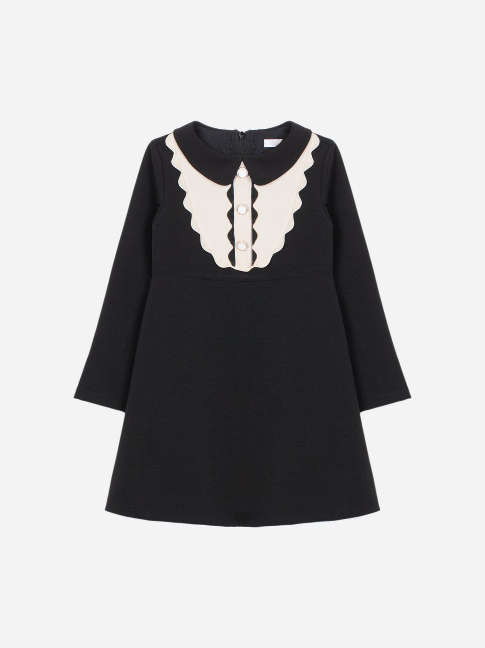 Black dress with elegant detailing at the bust