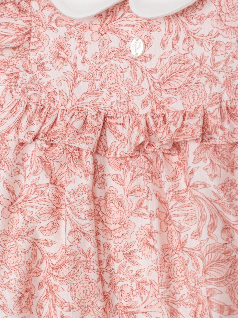 Pink romper with a Liberty print
