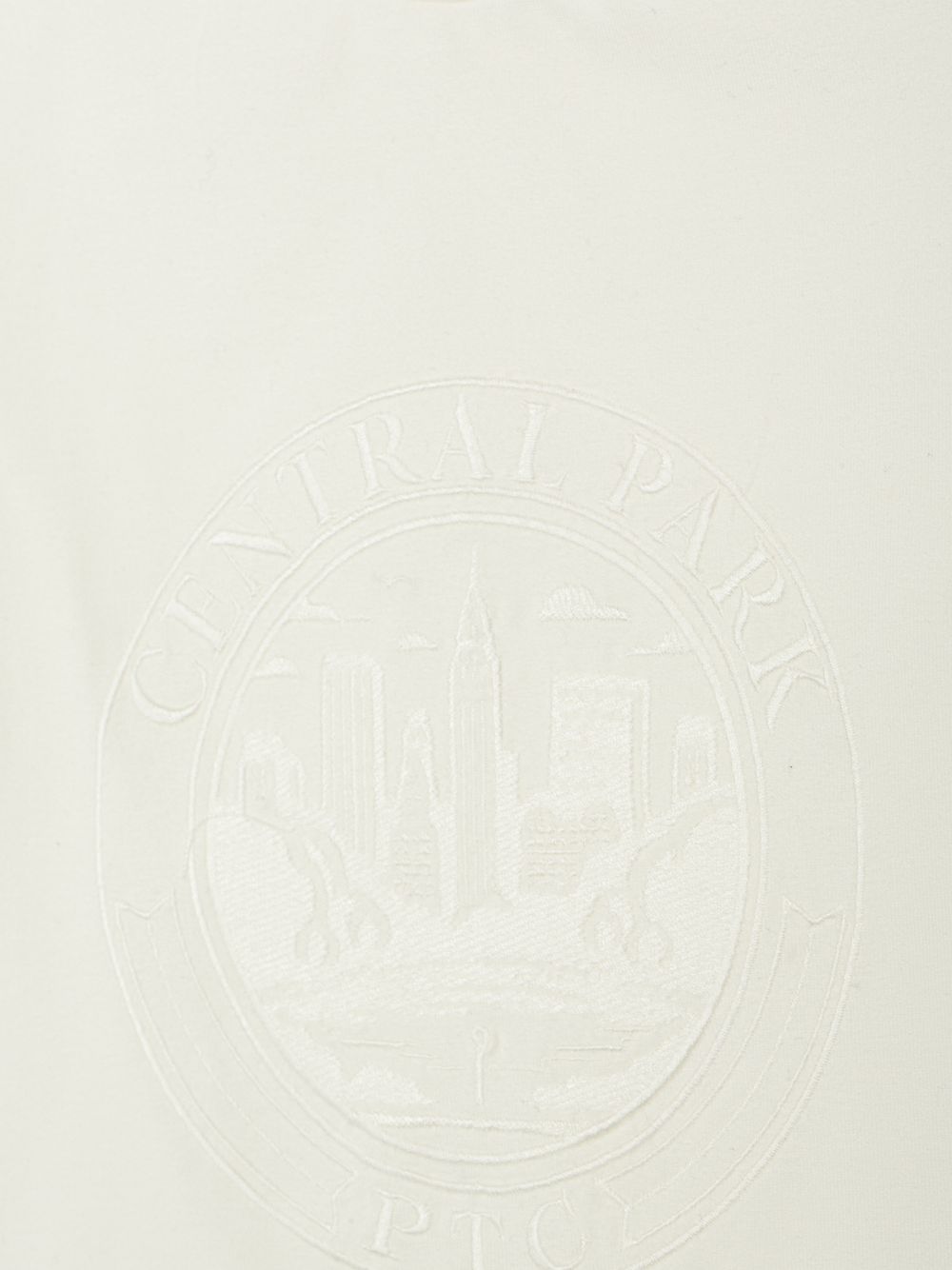 Ecru T-shirt with a design on the front