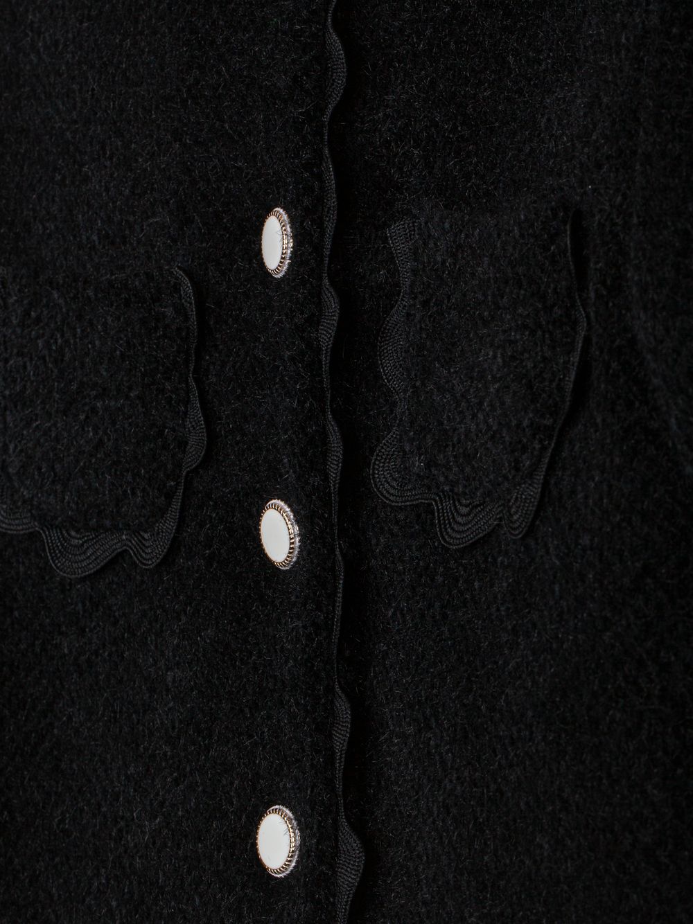 Elegant black coat with buttons and refined details