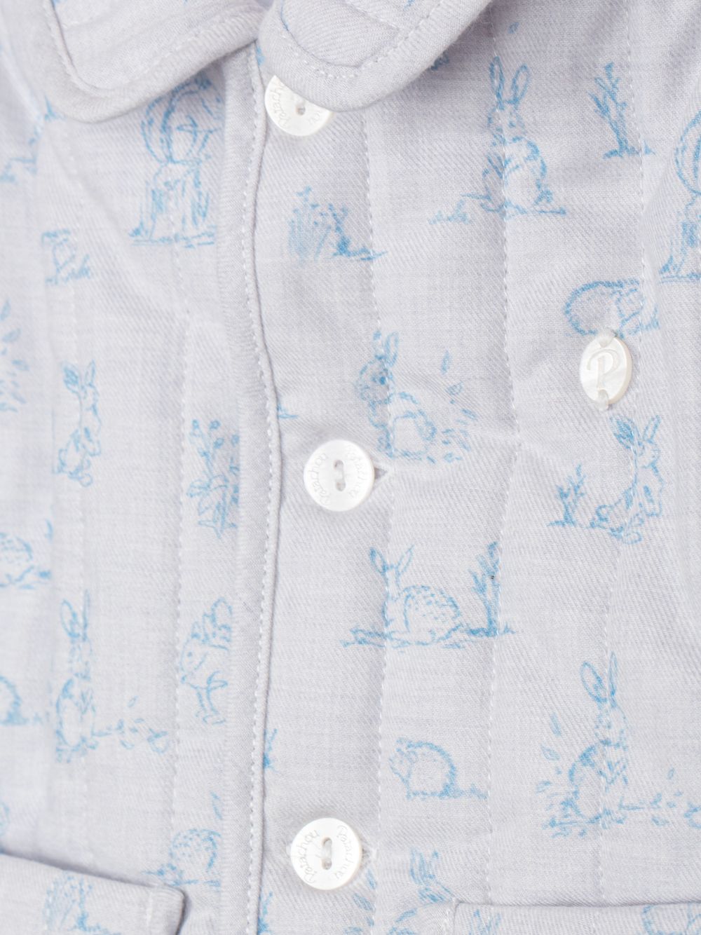 Elegant light blue coat with delicate print