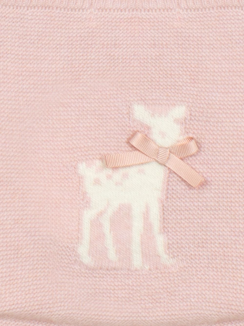 Pink knit pants with deer detailing and bows
